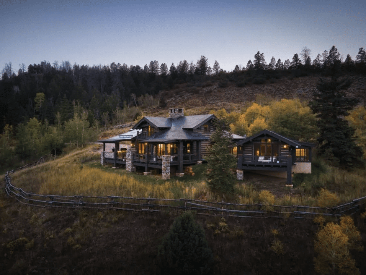 Dusk exterior image of luxury mountain retreat home for sale in Colorado